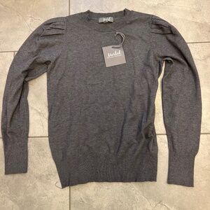 Marked Reunited sweater